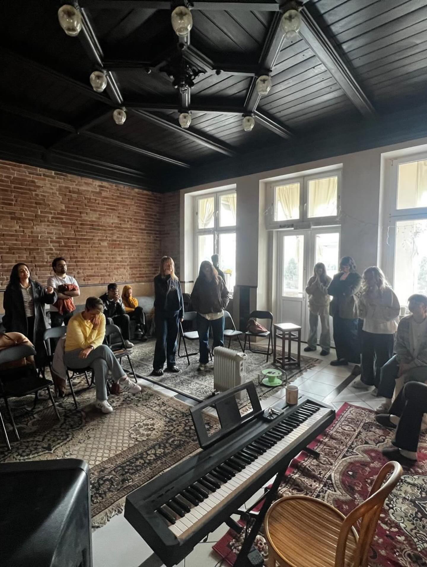 Karin Kriel with a gathered group in Poland